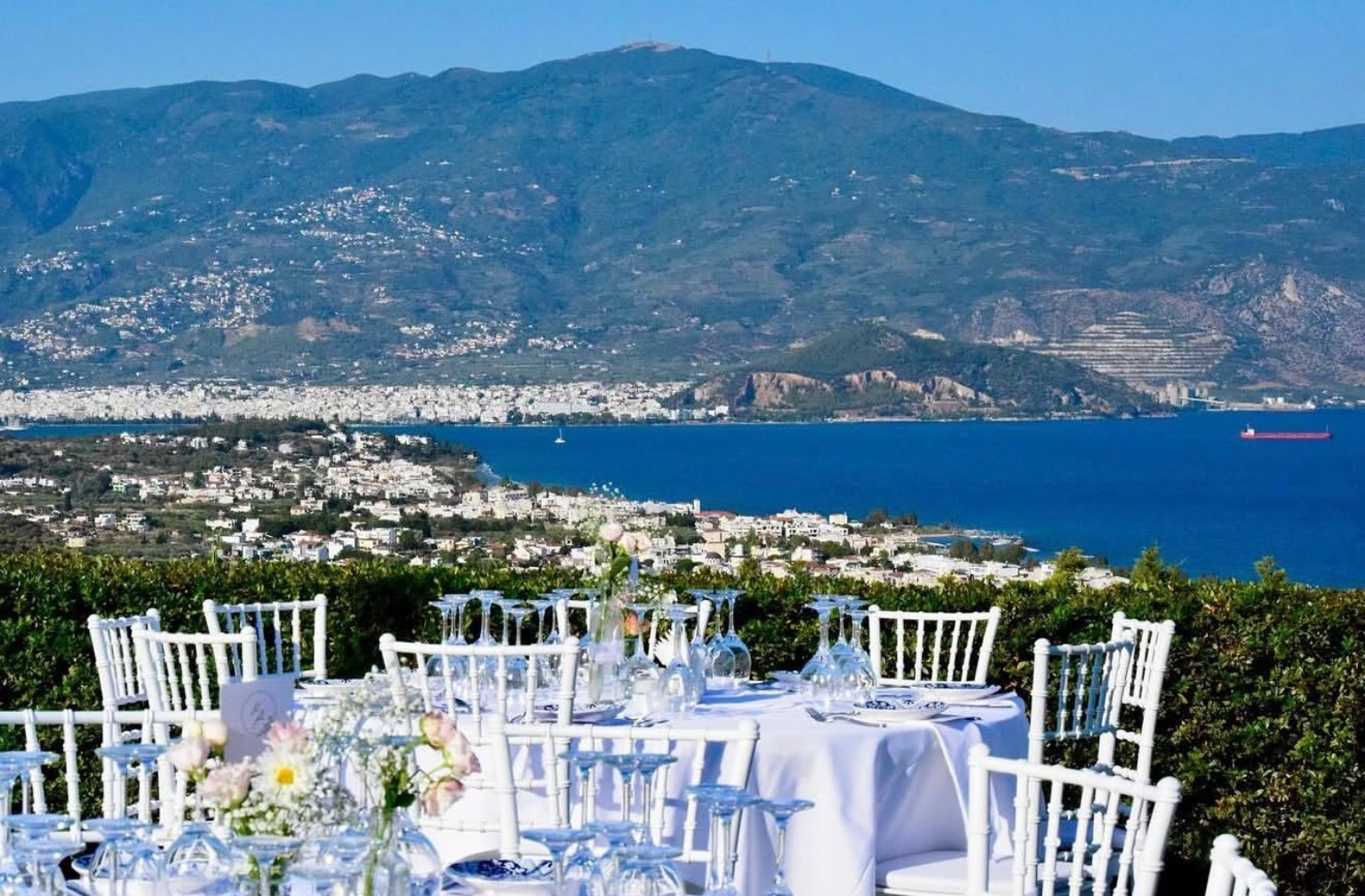 Staikos Events Venue terrace with tables overlooking Volos